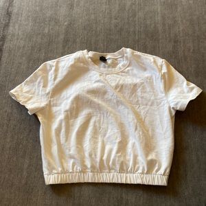 wild fable, white cropped T-shirt, with elastic band at the end. Size M